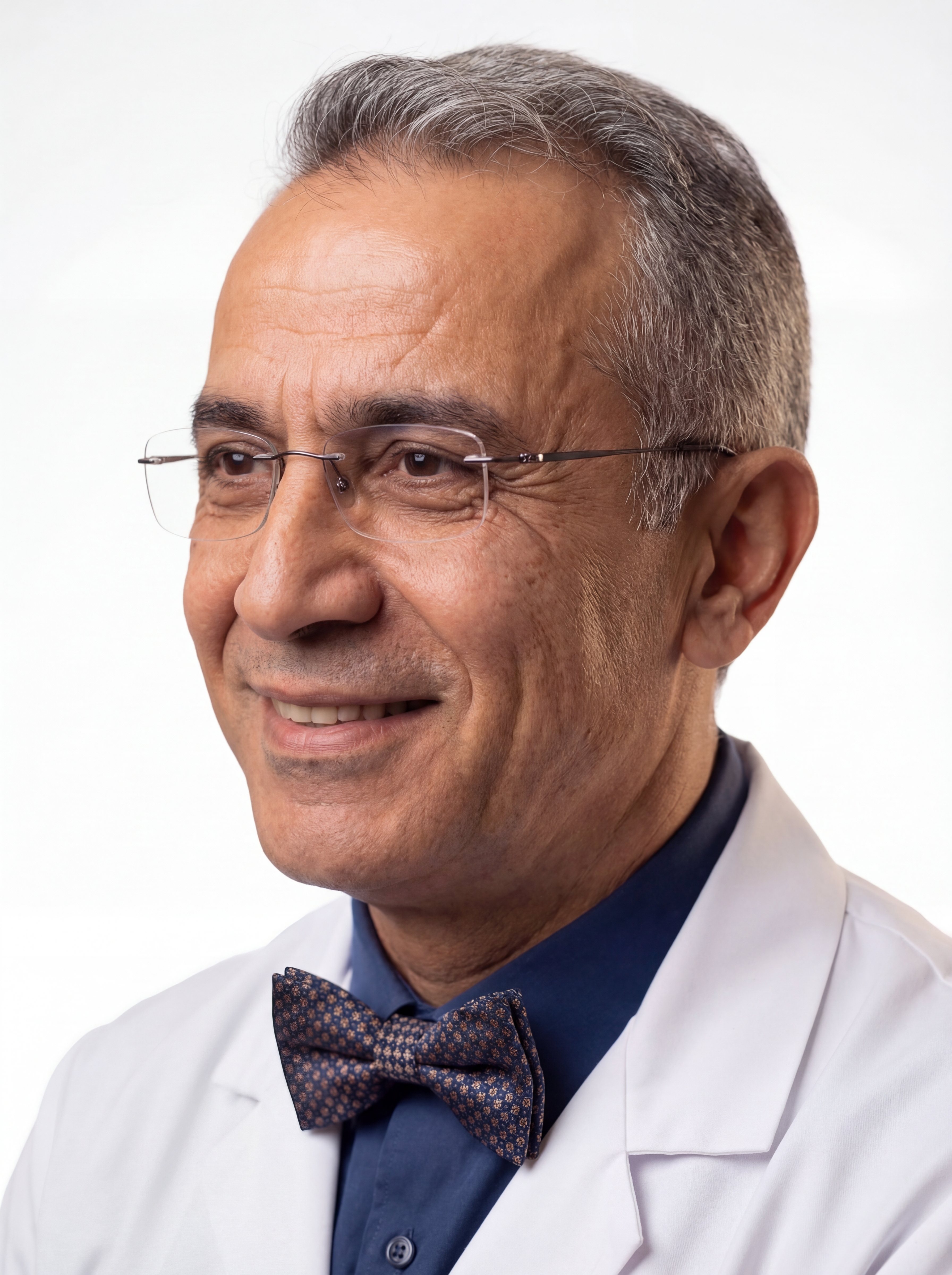 Prof. Dr. Cengiz Volkan Demirtaş — Portrait (left)