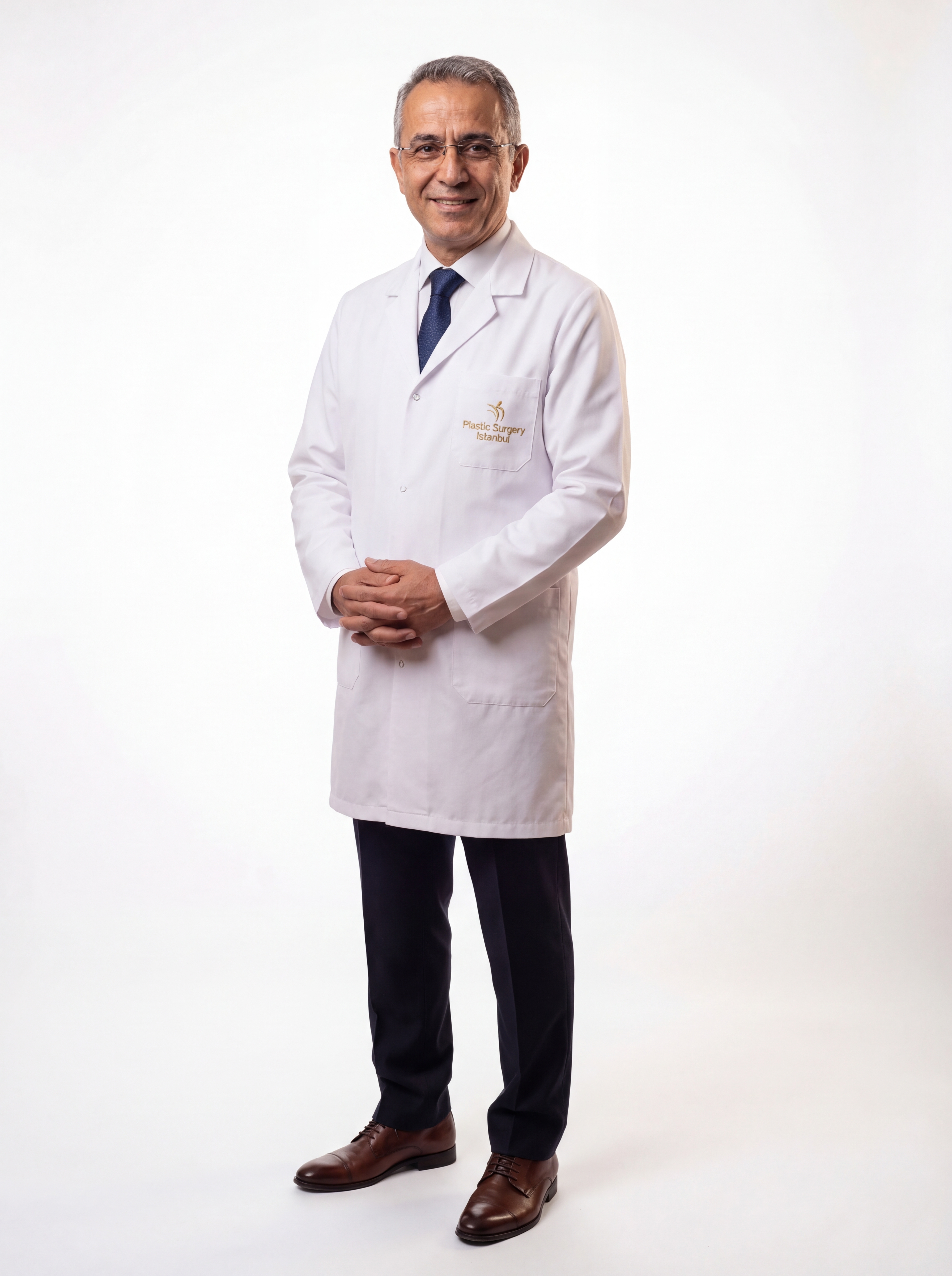 Prof. Dr. Cengiz Volkan Demirtaş — coat (right)